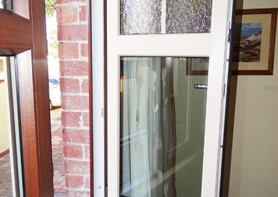 Double glazed window with rippled glass to match the traditional style of this home.
